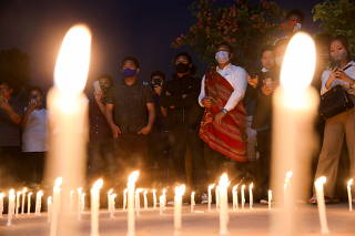 Candle vigil to pay tribute to people who died in Myanmar after the military coup, in New Delhi