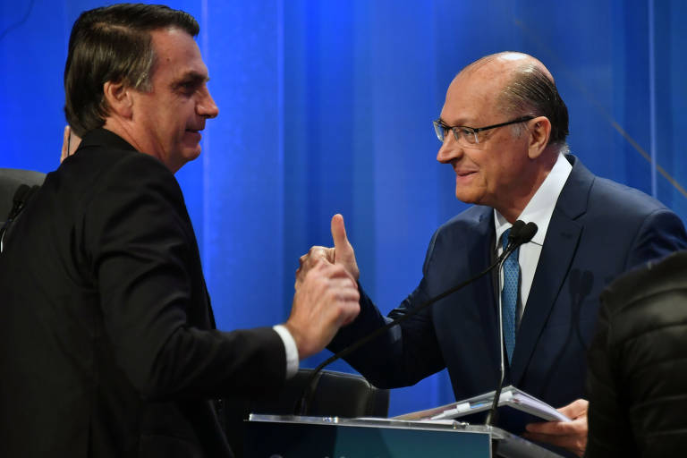 Os candidatos à Presidência Jair Bolsonaro (PSL) e Geraldo Alckmin (PSDB) durante debate na Rede TV