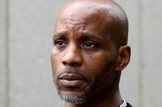 FILE PHOTO: Rapper DMX exits the U.S. Federal Court in Manhattan following a hearing regarding income tax evasion charges in New York