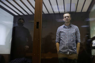 FILE PHOTO: FILE PHOTO: Russian opposition leader Alexei Navalny hearing to consider an appeal against an earlier court decision to change his suspended sentence to a real prison term
