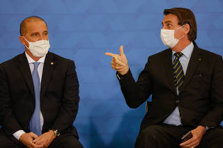 O presidente Jair Bolsonaro e o eputdo federal Onyx Lorenzoni