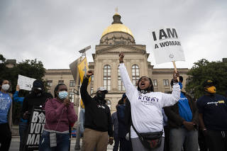 People protest outside the Georgia Capitol in Atlanta against a House bill on voting restrictions, Thursday, March 25, 2021. (Nicole Craine/The New York Times)