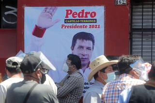 Supporters of Peru's presidential candidate Castillo stand in front of the party headquarters in Lima