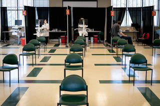 A lone person gets vaccinated for COVID-19 at a community health center in Elizabethton, Tenn., April 9, 2021. (Erin Schaff/The New York Times)