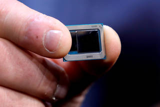 FILE PHOTO: An Intel Tiger Lake chip is displayed at an Intel news conference during the 2020 CES in Las Vegas
