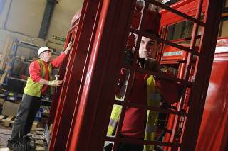 Red telephone boxes is seen being renovated at X2 Connect in Newark