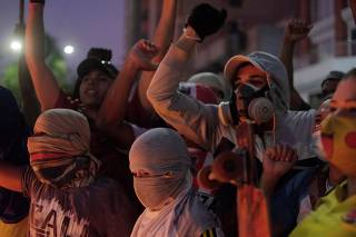 Demonstrators gather during a protest against a Copa Libertadores soccer match, in Barranquilla