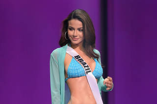 Headline: 69th Miss Universe Competition® - Preliminary Competition - Ema Savhal Couture Swimwear