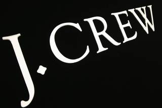 A logo for the clothing retailer J.Crew is seen outside a J.Crew store in Manhattan, New York