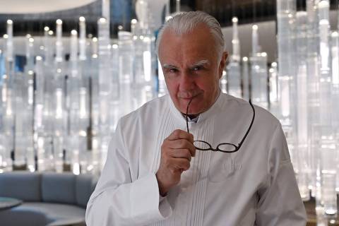 (FILES) In this file photo taken on June 18, 2019 chef Alain Ducasse poses for a picture during an interview with AFP at his restaurant Alain Ducasse at the Morpheus hotel in Macau. - Alain Ducasse, the most starred French chef in the world, will leave the restaurant of the Parisian palace Le Plaza Athénée, which he has directed since 2000 and where he imposed the very avant-garde concept of 