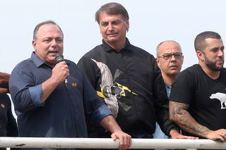 Brazil's President Bolsonaro and former Health Minister Pazuello attend a rally in Rio de Janeiro