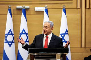 Leader of Israeli Opposition Benjamin Netanyahu speaks during a meeting with his Likud party in the Knesset, the Israeli parliament, in Jerusalem