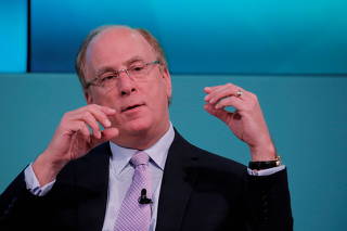 FILE PHOTO: Larry Fink, Chief Executive Officer of BlackRock, takes part in the Yahoo Finance All Markets Summit in New York