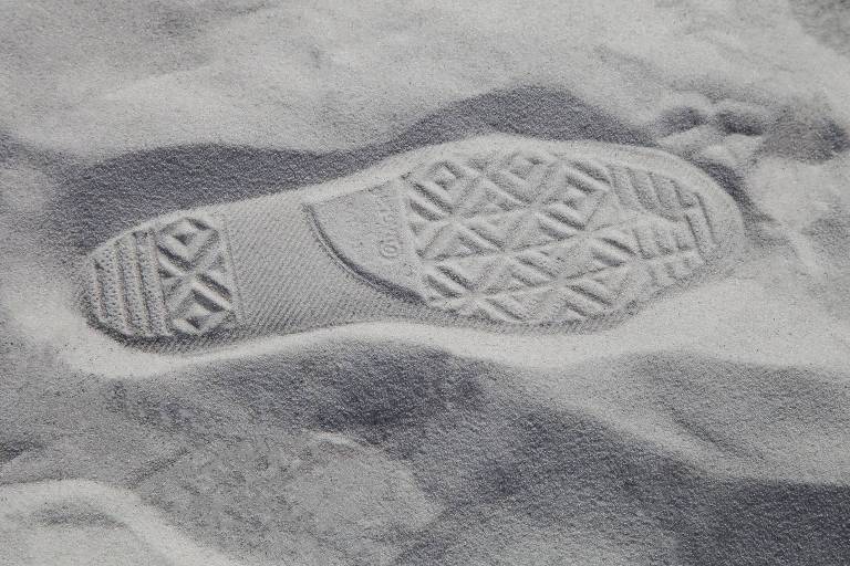 Pegada de sapato na areia
