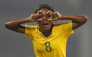 Brazil's Formiga celebrates her goal against Germany during their women's semi-final soccer match in Shanghai Stadium at the Beijing 2008 Olympic Games