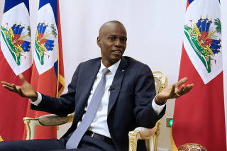 FILE PHOTO: Haiti's President Jovenel Moise speaks during an interview with Reuters at the National Palace of Port-au-Prince