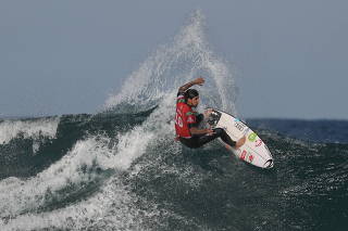 FILE PHOTO: Surfer Gabriel Medina of Brazil competes in a WSL competition in northern Sydney