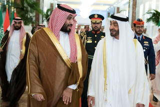 FILE PHOTO: Abu Dhabi's Crown Prince Sheikh Mohammed bin Zayed al-Nahyan receives Saudi Crown Prince Mohammed bin Salman at the Presidential Airport in Abu Dhabi