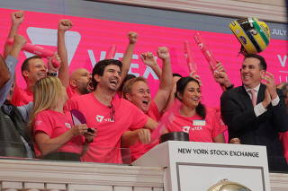 Geraldo Thomaz and Mariano Gomide De Faria, Co-CEOs of VTEX ring the opening bell to celebrate the company's IPO at the NYSE in New York