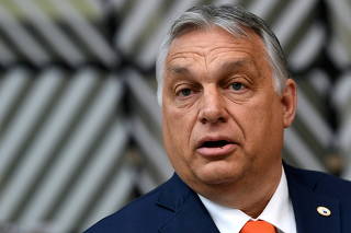 FILE PHOTO: Hungary's Prime Minister Viktor Orban addresses the media as he arrives on the first day of the European Union summit at The European Council Building in Brussels, Belgium June 24, 2021.