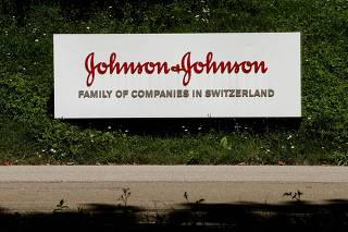 FILE PHOTO: The logo of pharmaceuticals company Johnson & Johnson is seen in Zug