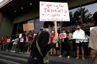 FILE PHOTO: Protesters surround the LA Superior Court to prevent an upcoming wave of evictions and call on Governor Gavin Newsom to pass an eviction moratorium, amid the global outbreak of coronavirus disease (COVID-19), in Los Angeles