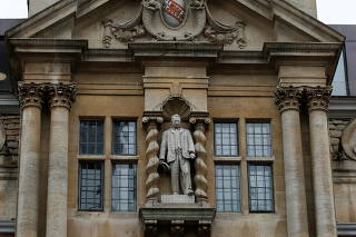 FILE PHOTO: A statue of Cecil Rhodes, a controversial historical figure, is seen outside Oriel College in Oxford