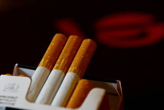 FILE PHOTO: An illustration picture shows a pack of Marlboro cigarettes in a coffee house in Vienna