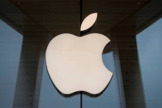 FILE PHOTO: The Apple logo is seen at an Apple Store, as Apple's new 5G iPhone 12 went on sale in Brooklyn, New York