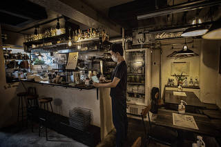 Makoto Inoue at Ocho Taqueria, the restaurant he borrowed heavily to open in 2018, near the Olympic Stadium in Tokyo, Aug. 6, 2021.  (James Whitlow Delano/The New York Times)