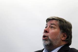 Steve Wozniak, co-founder of Apple Computer, pauses before answering question from floor after speaking at seminar in Singapore