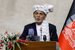 FILE PHOTO: Afghan President Ashraf Ghani speaks at the parliament in Kabul