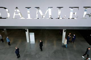 FILE PHOTO: The Daimler logo is seen before the Daimler annual shareholder meeting in Berlin,