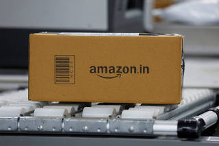 FILE PHOTO: A shipment moves on a conveyor belt at an Amazon Fulfillment Centre (BLR7) on the outskirts of Bengaluru