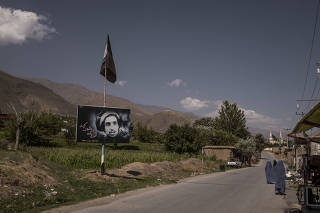 A portrait of the late Ahmad Shah Massoud by the side of the road in Panjshir, Afghanistan, Sept. 1, 2020. (Jim Huylebroek/The New York Times)