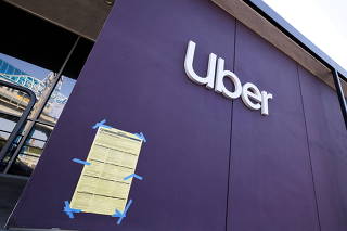 FILE PHOTO: An Uber logo is seen in Redondo Beach, Los Angeles