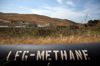 FILE PHOTO: A pipeline that moves methane gas from the Frank R. Bowerman landfill to an onsite power plant is shown in Irvine, California