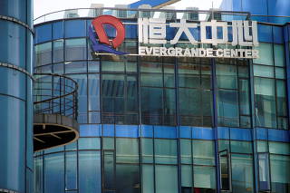 Logo of China Evergrande Group seen on the Evergrande Center in Shanghai