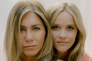 Jennifer Aniston, left, and Reese Witherspoon in Los Angeles, Sept. 10, 2021. (Amy Harrity/The New York Times)