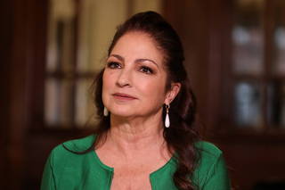 FILE PHOTO: Singer Gloria Estefan talks during an interview at the London Coliseum theatre where her 