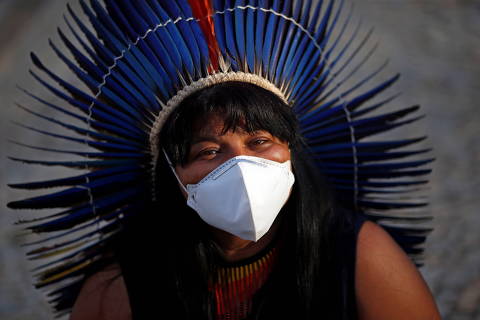 Indigenous Leader Sonia Guajajara of the Guajajara tribe looks on during a protest for land demarcation and against President Jair Bolsonaro's government, in Brasilia, Brazil June 14, 2021. REUTERS/Adriano Machado ORG XMIT: GGGAHM12