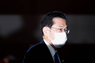 Japan's newly-elected PM Kishida arrives at his official residence in Tokyo
