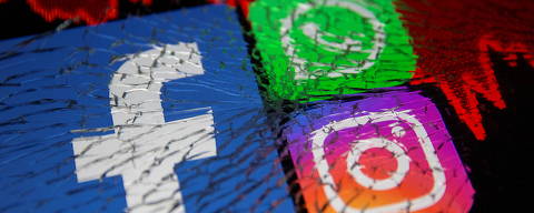 Facebook, Whatsapp and Instagram logos and stock graph are displayed through broken glass in this illustration taken October 4, 2021. REUTERS/Dado Ruvic/Illustration ORG XMIT: PPP-DAD007