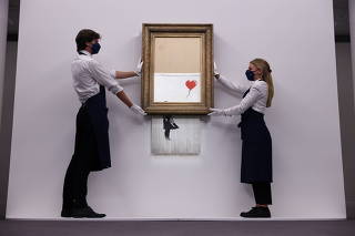FILE PHOTO: Banksy's 'Love is in the Bin' photocall at Sotheby's