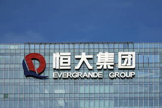 FILE PHOTO: The logo of China Evergrande Group is seen on the company's headquarters in Shenzhen