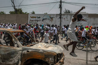 Members of the G9 gang protest over the assassination of President Jovenel Mose, in Port-au-Prince, Haiti, July 26, 2021. (Victor Moriyama/The New York Times)