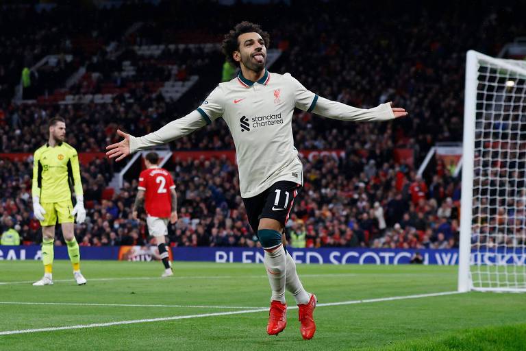 Salah comemora seu terceiro gol contra o United