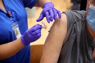 Veterans Affairs Hospital Outside Of Chicago Continues Vaccinations Efforts