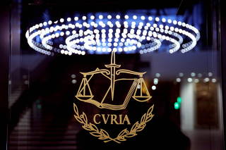 FILE PHOTO: The logo of the European Court of Justice is pictured outside the main courtroom in Luxembourg