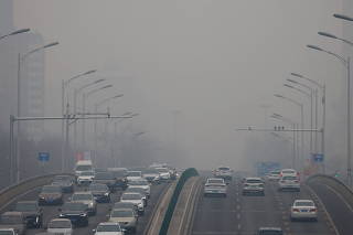 FILE PHOTO: Polluted day in Beijing
